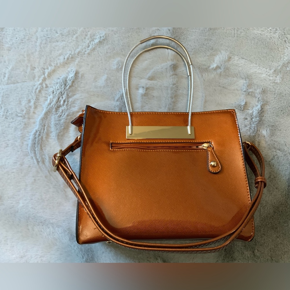 Rust flux leather / plastic handbag